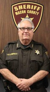 Howard Buffett was the sheriff of Macon County, Illinois.